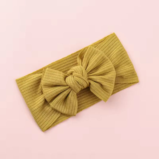 brass shade of ribbed bow headbnd